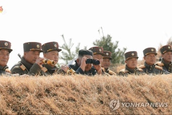 김정은, 코로나 와중 잇단 군사행보…