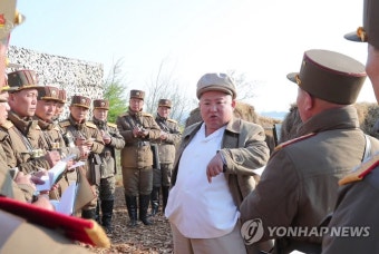김정은, 포사격 훈련 지도