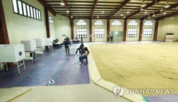 씨름장에서 소중한 한표