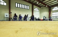 씨름장에서 소중한 한표