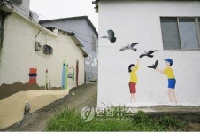벽화마을로 명성 얻었던 부산 돌산마을 사라진다