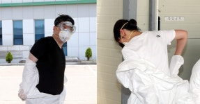 5분만 있어도 땀 줄줄…한증막 방호복 악전고투 의료진