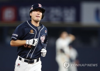 홈인하는 두산 김재호