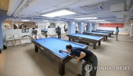 큐스쿨 토너먼트 집중하는 선수들