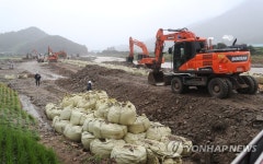 빗속에도 복구작업 분주