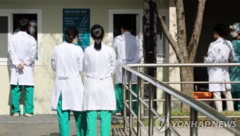 아산병원 전공의 복귀, 코로나 검사받는 의료진