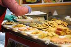 전 부치는 상인