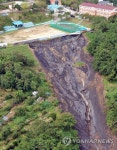 [장마, 불안한 부산]② 비 올 때마다 검정물 줄줄 구평동 산사태 현장
