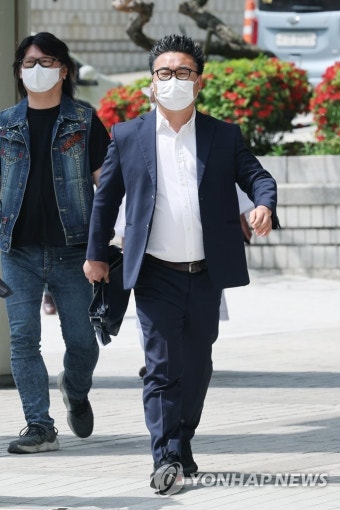 1심 선고 출석하는 서울의소리 이명수 기자