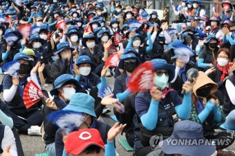 금속노조 총파업, 부채가 된 팻말