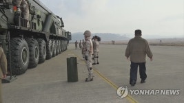 北, 미사일 321호 TEL에 영웅칭호·훈장까지…완성형 과시