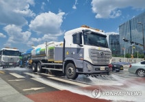 도로 먼지와 주변 더위도 한 번에