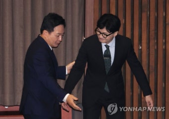 대화 나눈 원희룡 국토교통부 장관과 한동훈 법무부 장관