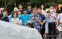 폭염 속 전기차 화재 진압 시연에 쏠린 시선