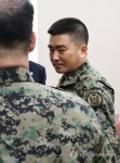 회의장 나서는 707 특임단장