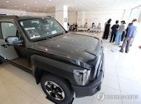 자동차 매장에 설치된 투표소