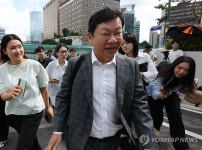 윤재현 참손푸드 대표, 특검 출석