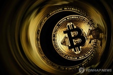 비트코인 관세 불확실성까지…한때 6만5천달러 밑으로
