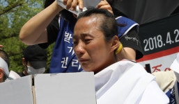 발달장애인 가족 555명이 청와대 앞에서 삭발한 이유 대표 이미지