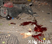 유혈 낭자한 뭄바이 테러현장의 모습
