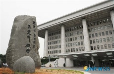 헌정기념관 앞으로 이전하는 국회개원60주년 기념비
