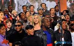 아이티, 4반세기만에 살려냈다 위아더월드