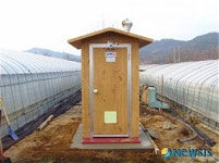 밀양 시설하우스 집단지역 이동식 화장실 호평