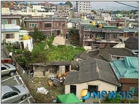 꼬불꼬불 옛길이 번듯한 소방도로로, 울산 중구 주거환경개선사업 주목