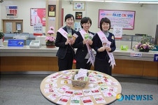 성북우체국, 식목일 꽃씨 나눠주기 행사