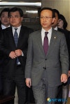 입장하는 현인택 장관