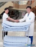 동남권원자력의학원, 지역 경로당에 이불 기증