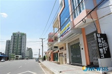 캄코시티 정문 앞 한국부동산 중개소