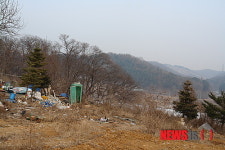 군수 땅에 슬그머니 도로계획 밑그림