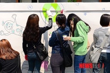 아이사랑 벽화 그리기 나선 동신대 학생들