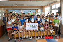 기증받은 책으로 꿈을 키우는 우성어린이