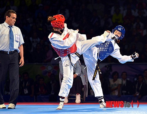 한국 선수 김유진, 16년 만에 여자 57kg급에서 올림픽 금메달 획득 경신