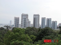 평양서 책팔고 돌아온 통일운동가 오인동박사..만수대에서 바라본 아파트단지