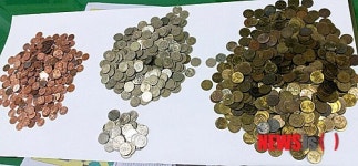 26년간 거리서 주운 동전 이웃돕기에 쓴 환경미화원