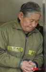 어두운 표정의 김한식