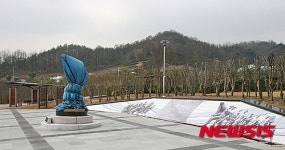 준공 앞둔 연제근공원과 베일 가려진 동상
