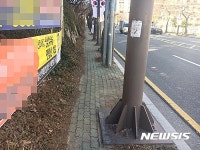 봉수로 보도확장 공사 장기화…통행불편 계속