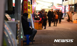구제역이 걱정스런 축산물시장 상인