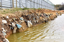 한국환경공단 서천 공사장서 나온 수천톤 생활쓰레기