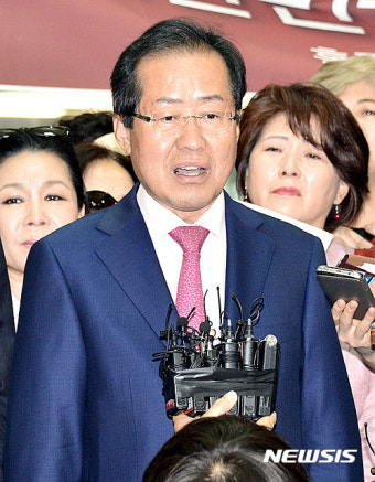 미국행 홍준표, 당권논란에 