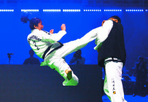 절제된 동작, 강력한 파괴력… ‘같은 듯 다른’ 北 태권도