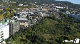 상암동 주민들 송현동 부지-서부면허시험장 맞교환 결사반대