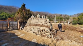 승산마을 만석꾼 집 마당에 작은 금강산이 들어선 이유