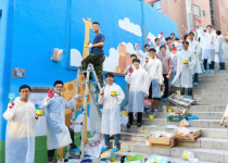 현대엔지니어링, 창신동 낙산성곽동길서 벽화그리기 봉사활동 실시
