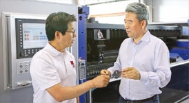 불황에도 생산능력 3배 늘려…레이저가공기로 글로벌시장서 도약