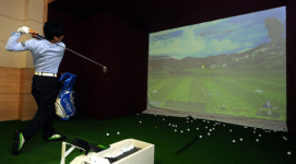 명절놀이? 고스톱보다 스크린골프가 대세